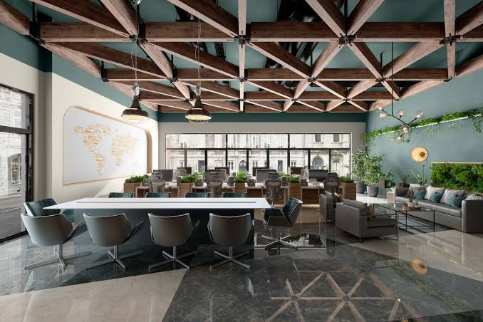 Office interior with teal-green accent walls and white trim by a painting company in Oviedo, FL